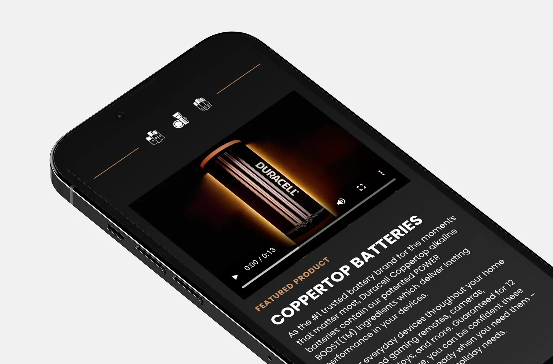 Closeup of a smartphone at an angle showcasing the copper top battery promotional section on the Duracell and Good Morning America (GMA) Partnership website.