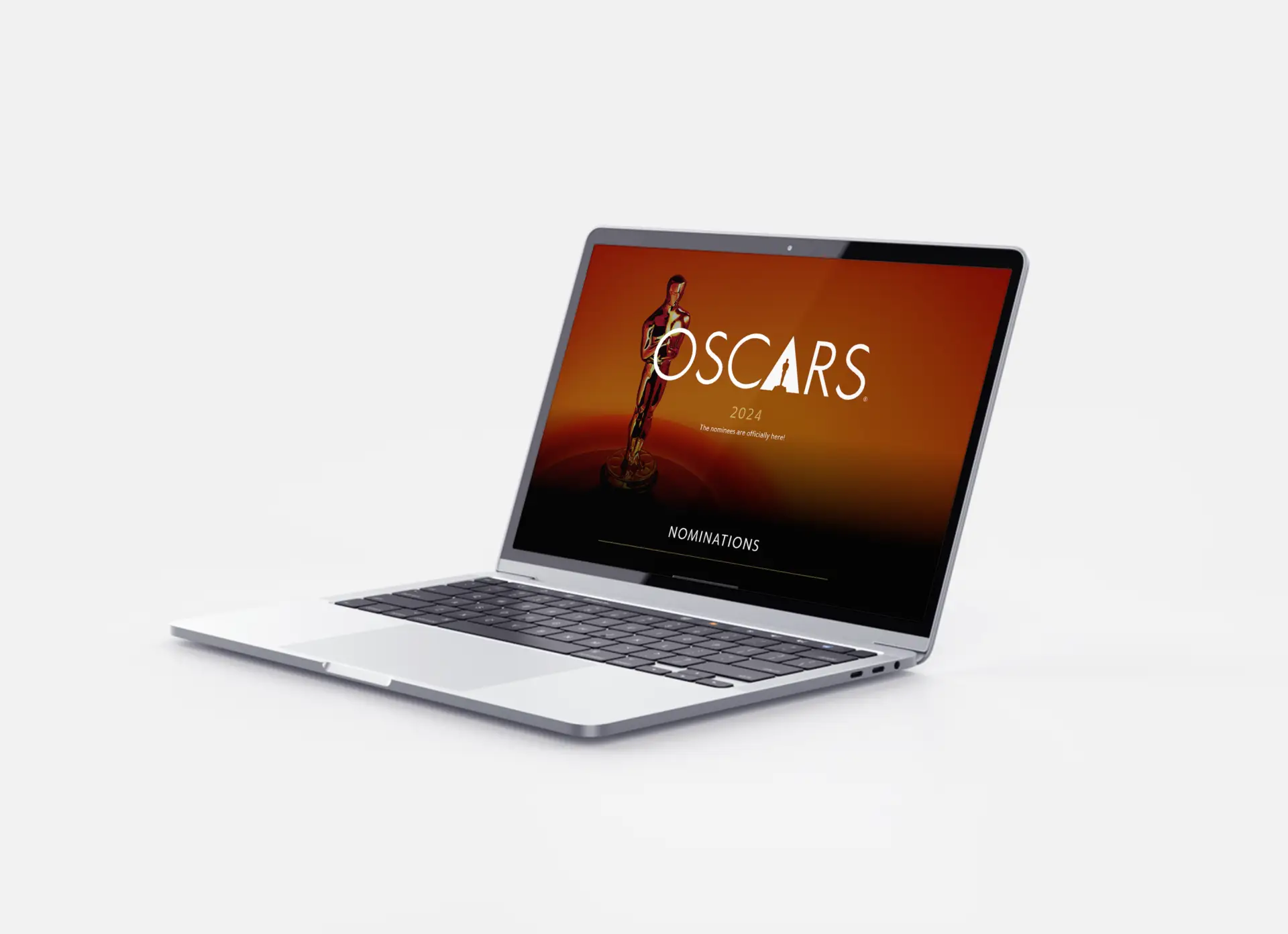 Image of a laptop at an angle showcasing a the header of the Nominations page on the Pfizer and Oscars Partnership website